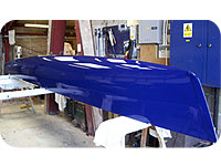 Newly painted outrigger of Trimeran